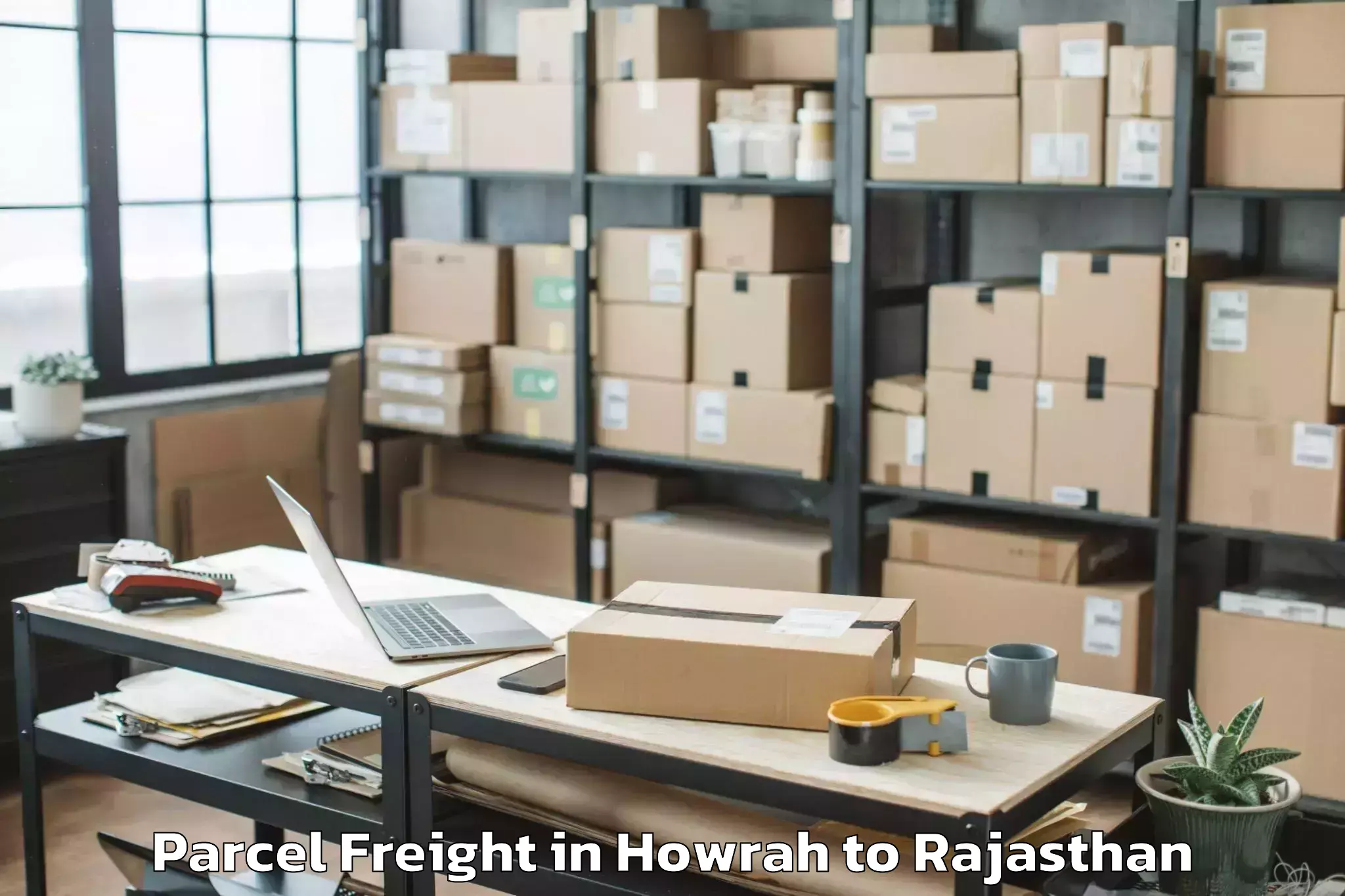 Book Howrah to Raffles University Neemrana Parcel Freight Online